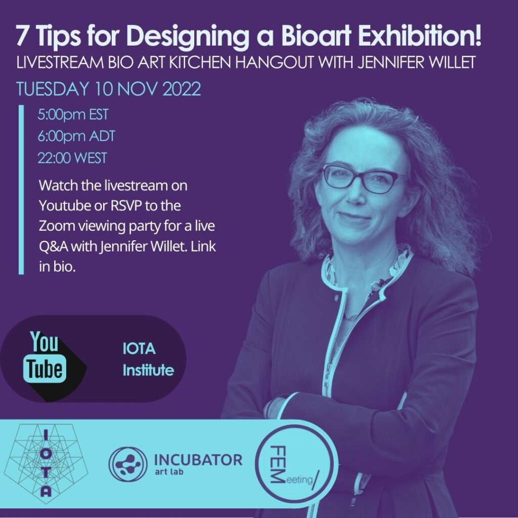 Event poster featuring headshot of white woman with grey hair, wearing a fitted black & white blazer, with arms crossed, gently smiling at the camera. There is a dramatic turquoise & dark purple filter on her image and the whole poster. White & blue text wraps around her image saying: "7 Tips for Designing a Bioart Exhibition! / Livestream Bio Art Kitchen Hangout with Jennifer Willet / Tuesday 17 Nov 2022 / 5:00pm EST / 6:00pm ADT / 22:00 WEST / Watch the livestream on Youtube or RSVP to the Zoom viewing party for a live Q&A with Jennifer Willet. Link in bio" Below are logos for Youtube, IOTA, Incubator Art Lab, and FEMeeting.